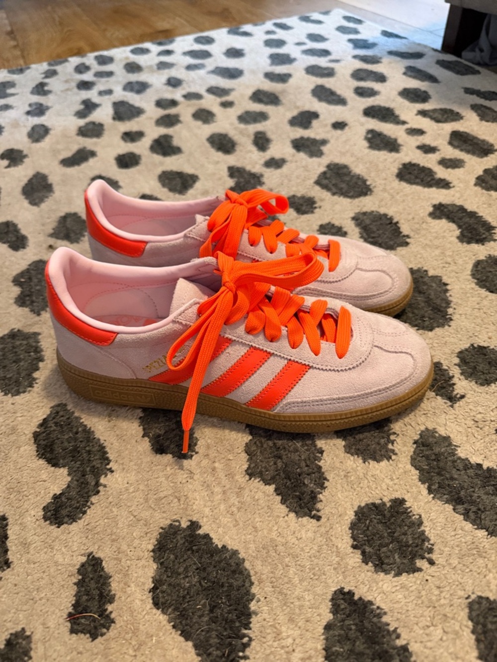 adidas Pink Suede Sneakers with Neon Orange Stripes and Laces